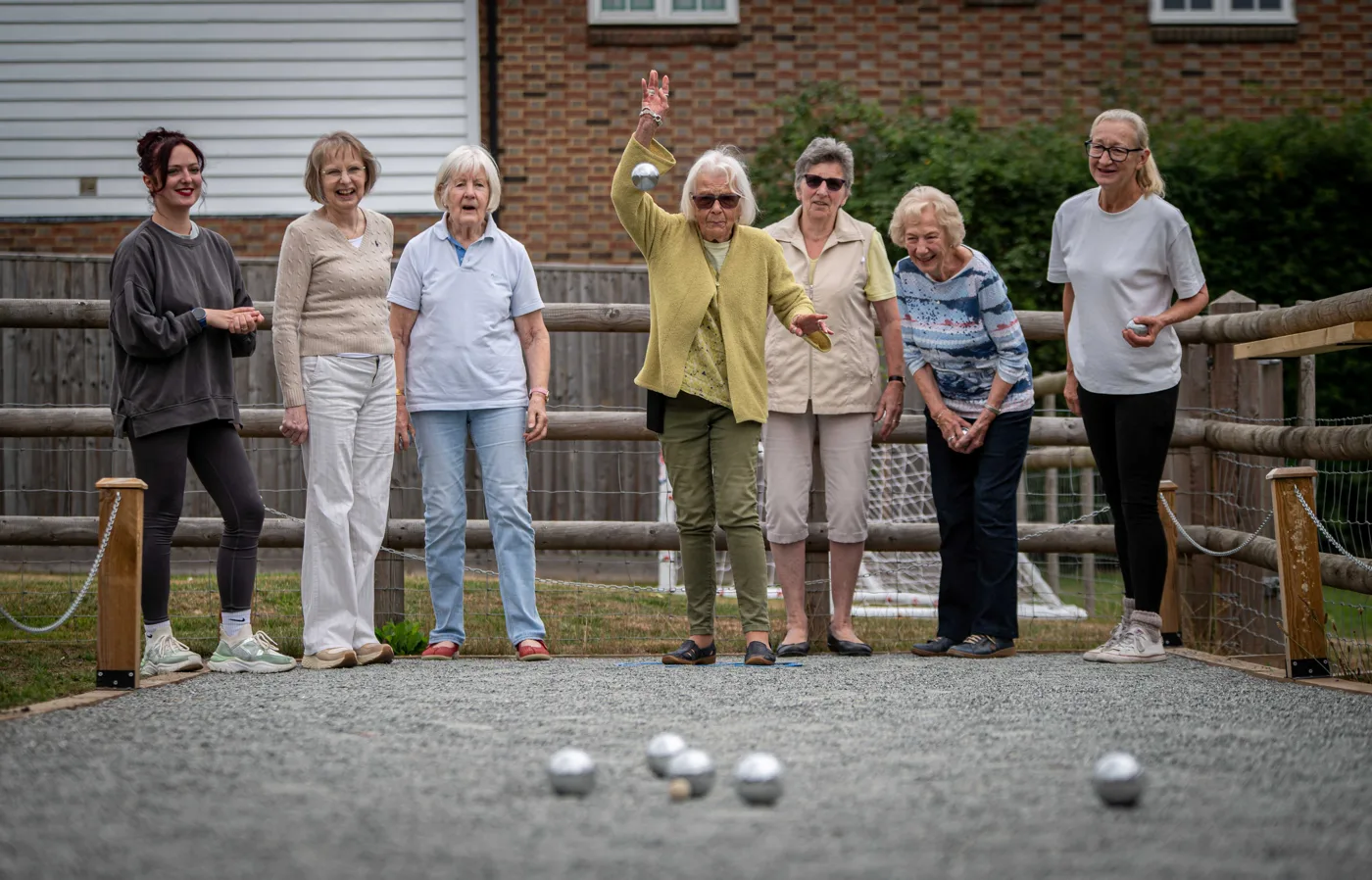 Players watch a throw on the new pétanque pitch at The George in Bethersden